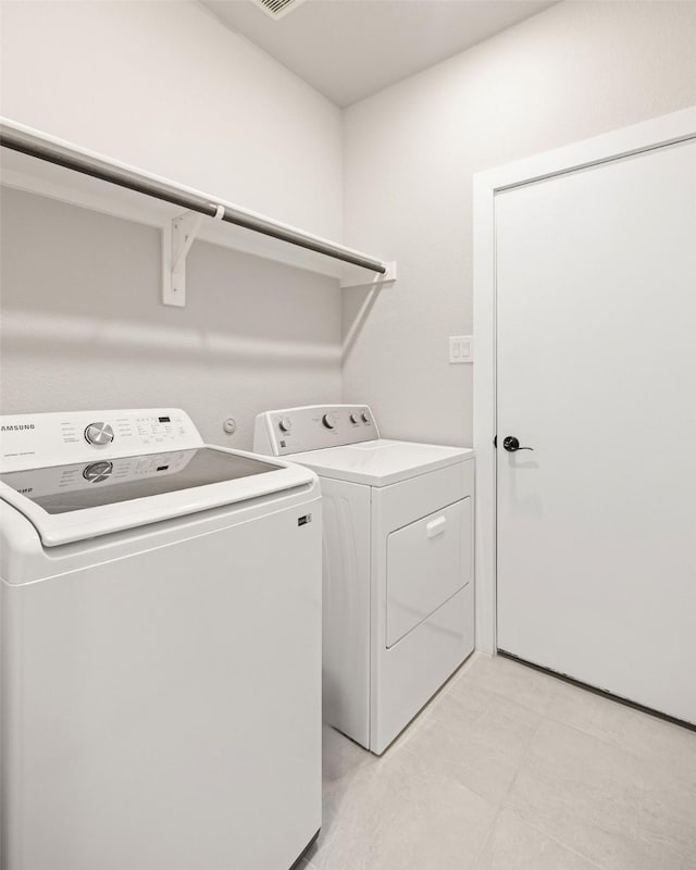 laundry area with washer and dryer and laundry area