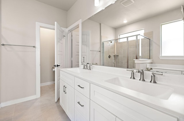 full bathroom with a shower stall, visible vents, a sink, and tile patterned floors