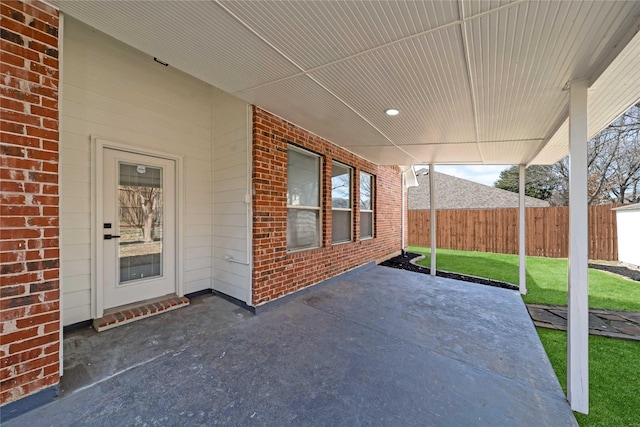 view of patio with fence