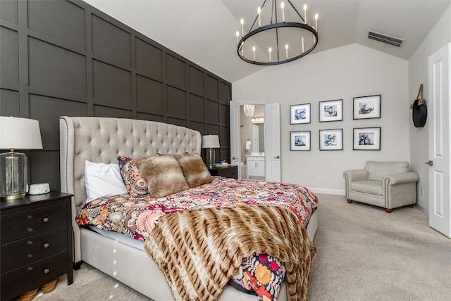 bedroom featuring lofted ceiling, light colored carpet, a decorative wall, visible vents, and an inviting chandelier