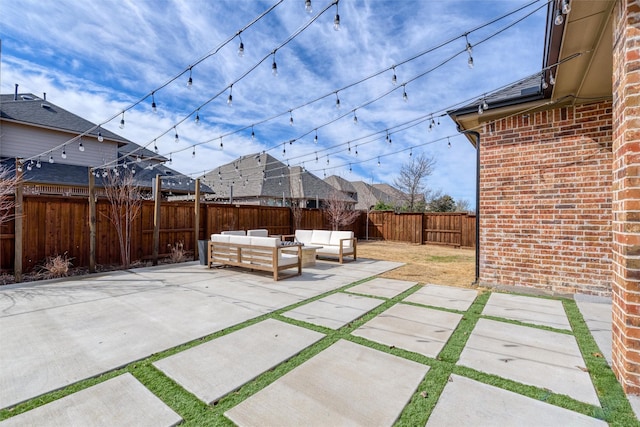 view of patio / terrace featuring an outdoor hangout area and a fenced backyard