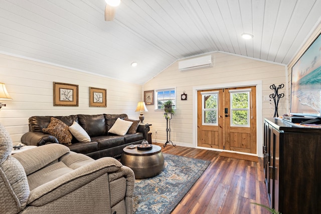 living room featuring lofted ceiling, wood ceiling, french doors, a wall mounted air conditioner, and dark wood finished floors