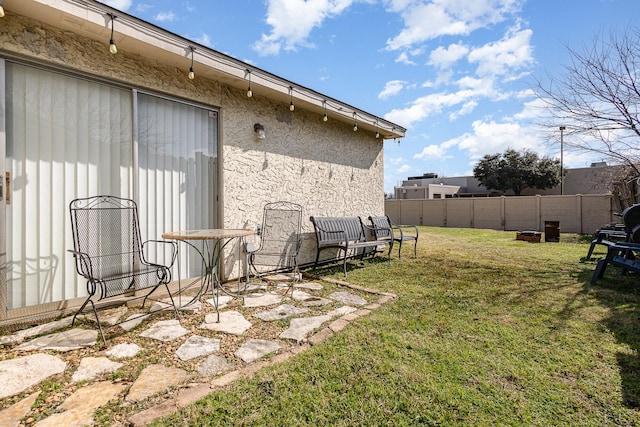 view of yard with fence