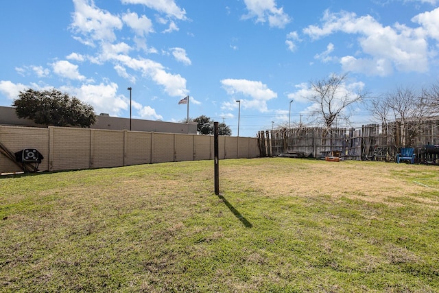 view of yard featuring fence