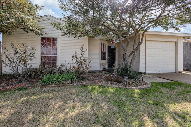 single story home with a garage, driveway, and a front lawn