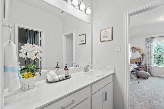 bathroom featuring visible vents and vanity