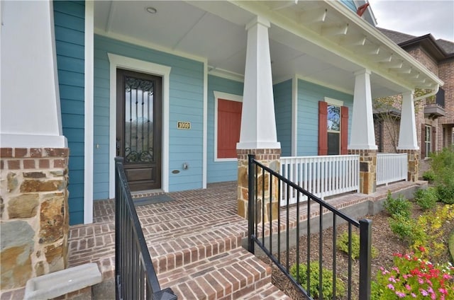 entrance to property with a porch