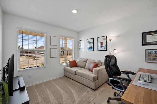 office with carpet floors and baseboards