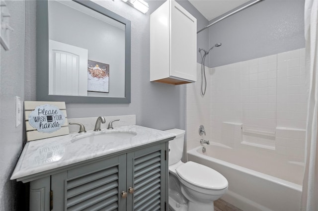 full bathroom with vanity, toilet, and shower / bath combo with shower curtain