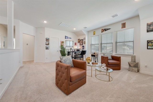 carpeted living area with baseboards, visible vents, vaulted ceiling, and recessed lighting