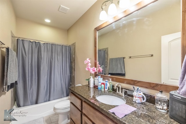 bathroom featuring toilet, visible vents, vanity, tile patterned floors, and shower / bath combo with shower curtain