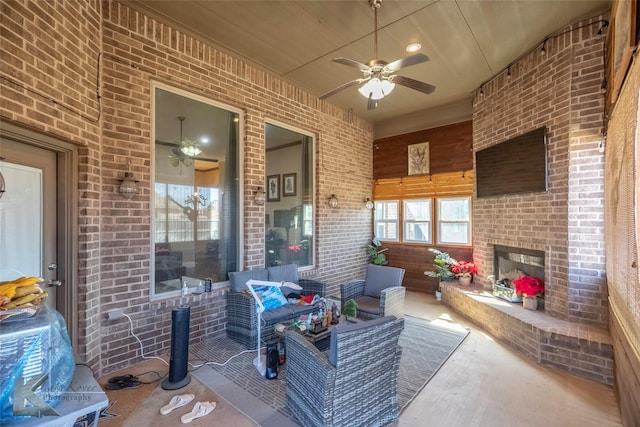 view of patio featuring an outdoor hangout area and a ceiling fan