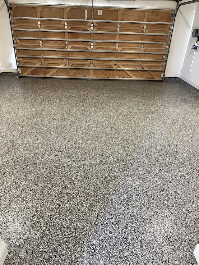 garage with baseboards