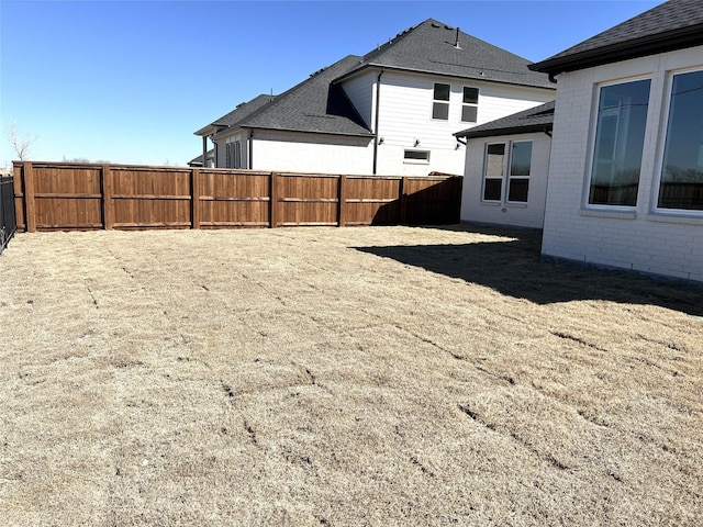 view of yard featuring fence private yard