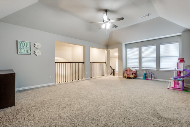 game room with ceiling fan, carpet, baseboards, and vaulted ceiling