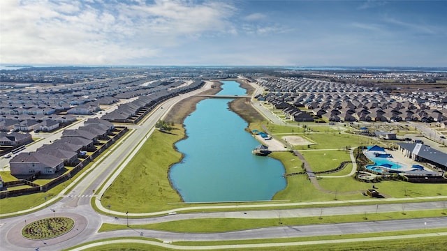 bird's eye view featuring a residential view and a water view