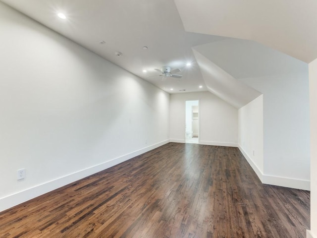 additional living space with a ceiling fan, recessed lighting, dark wood finished floors, and baseboards