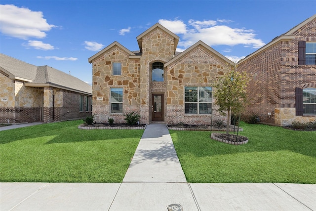 view of front of property with brick siding and a front lawn