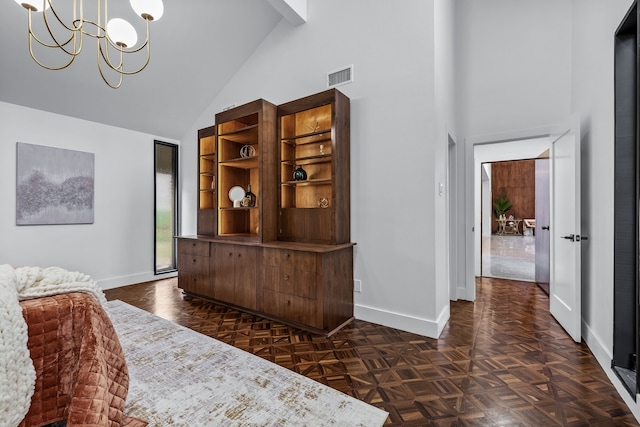 bedroom featuring baseboards, high vaulted ceiling, visible vents, and an inviting chandelier