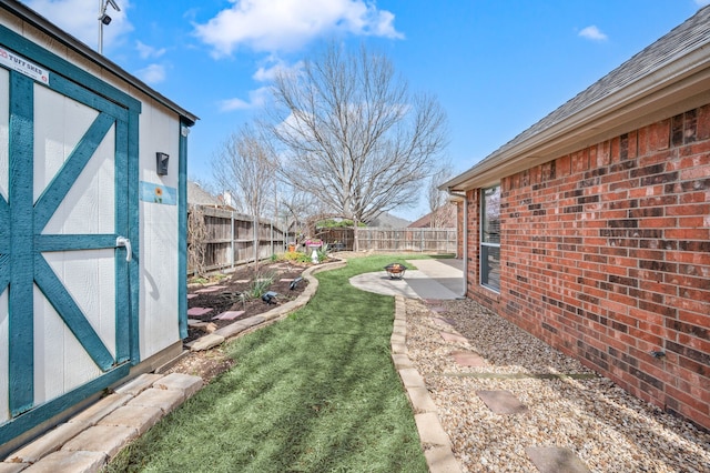 view of yard featuring a patio and a fenced backyard