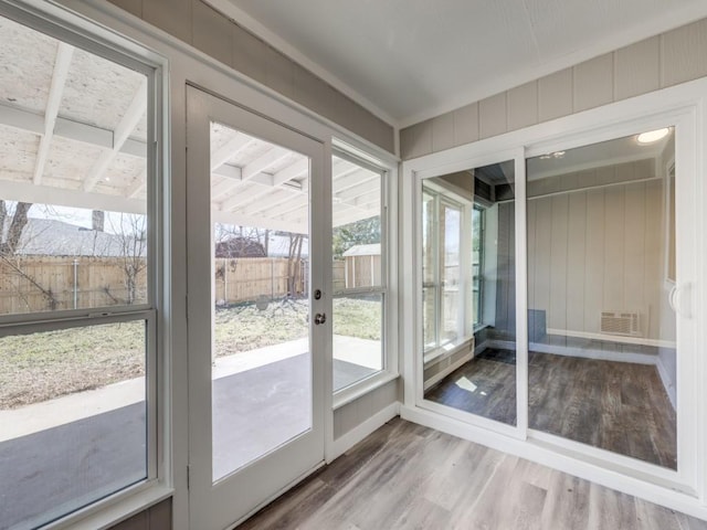 entryway featuring visible vents and wood finished floors