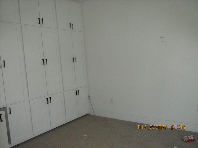 unfurnished bedroom featuring baseboards