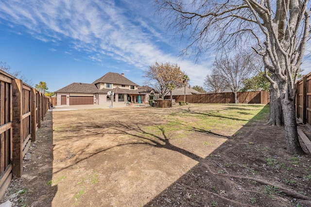 view of yard featuring a fenced backyard