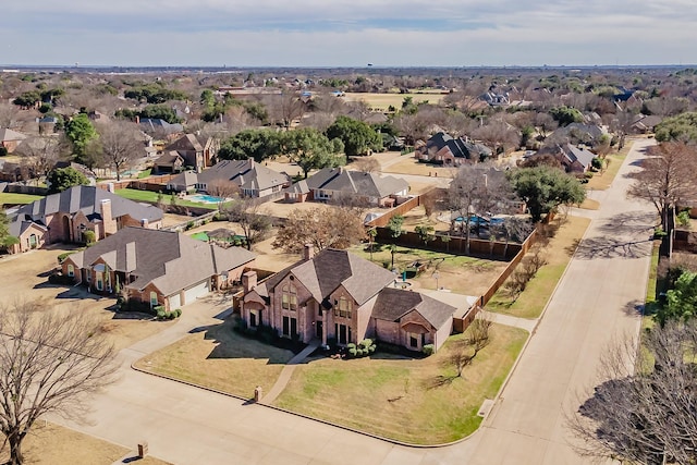 birds eye view of property with a residential view