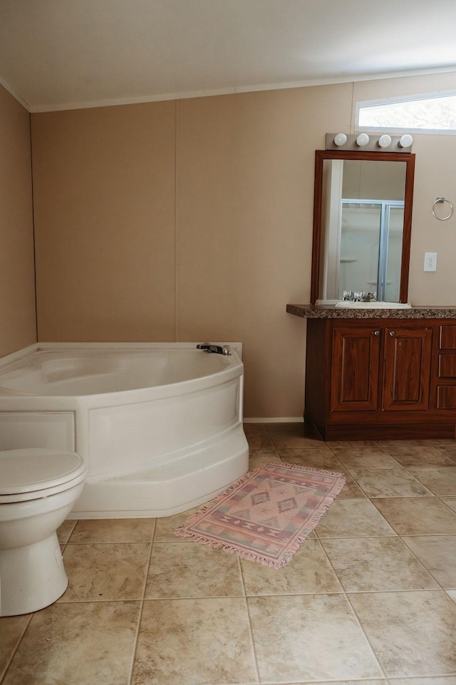 full bath featuring crown molding, toilet, vanity, a bath, and tile patterned floors