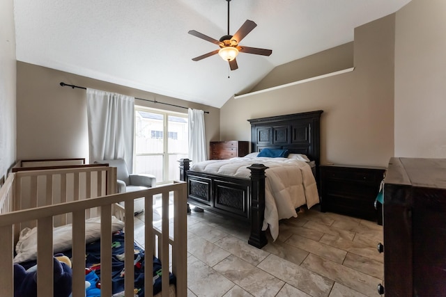 bedroom with vaulted ceiling and ceiling fan