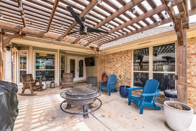 view of patio with french doors, grilling area, and a pergola