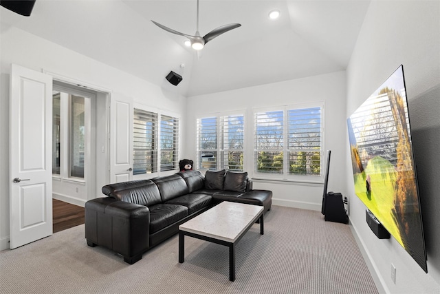 living room with baseboards, ceiling fan, carpet, vaulted ceiling, and recessed lighting