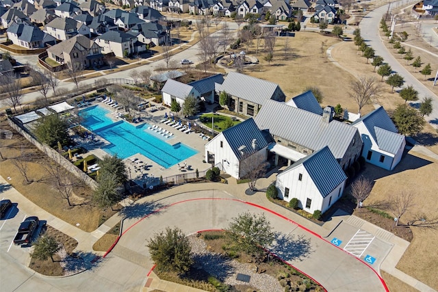 birds eye view of property with a residential view