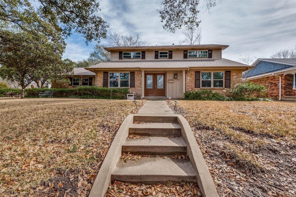 11752 Dixfield Dr, Dallas, TX 75218 - view of front of property featuring french doors and brick siding