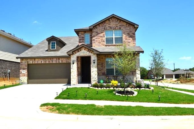 view of front of house with concrete driveway, a front lawn, an attached garage, and stone siding