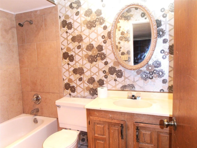 full bathroom featuring bathing tub / shower combination, vanity, toilet, and wallpapered walls