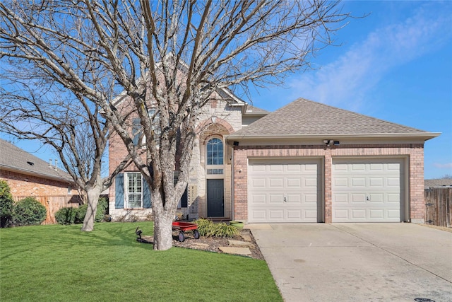 traditional-style house featuring an attached garage, brick siding, driveway, and a front yard