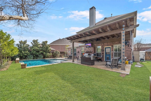 exterior space featuring a patio area, a fenced backyard, a pool with connected hot tub, and an outdoor living space