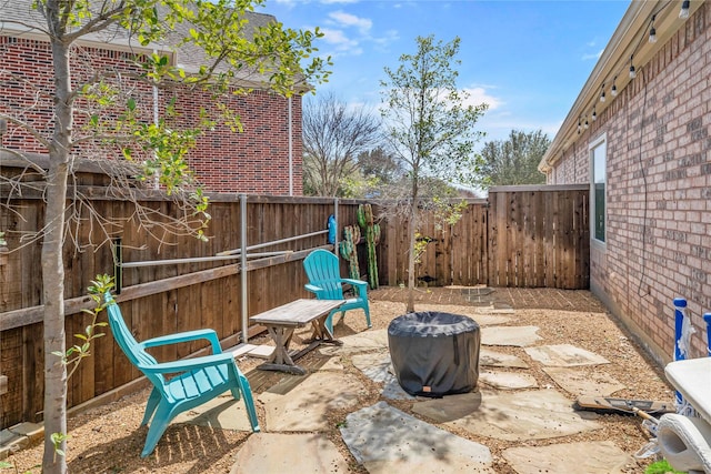 view of patio featuring a fenced backyard