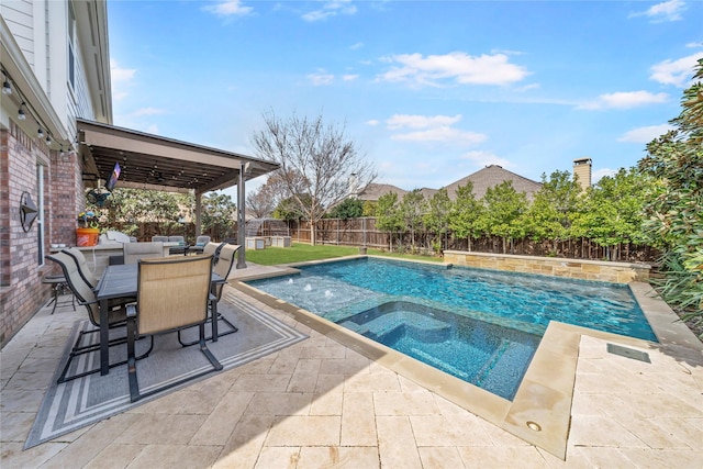 view of pool with outdoor dining area, a patio area, a fenced backyard, and a fenced in pool