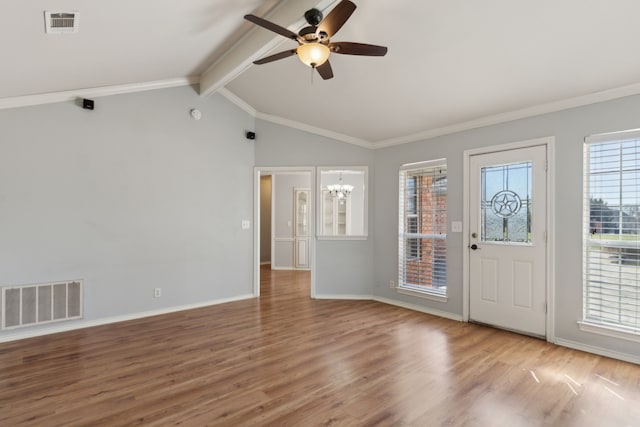 entrance foyer featuring visible vents, lofted ceiling with beams, baseboards, and wood finished floors