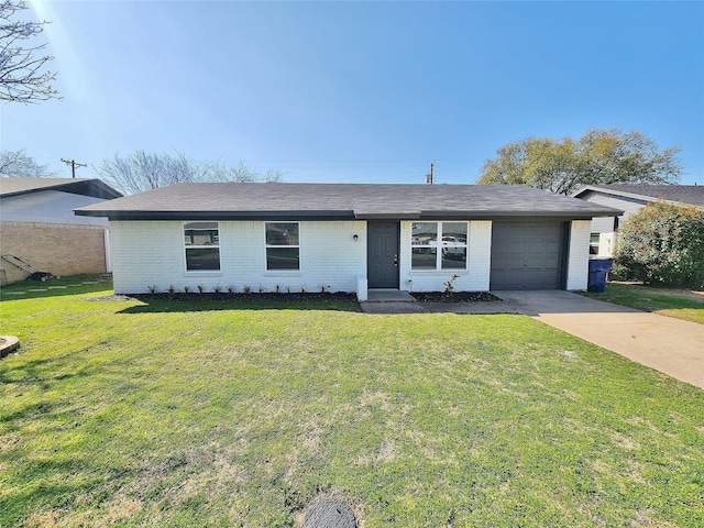 ranch-style house featuring a garage, brick siding, and a front lawn