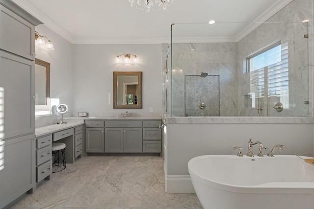 full bathroom featuring marble finish floor, crown molding, a soaking tub, vanity, and a walk in shower