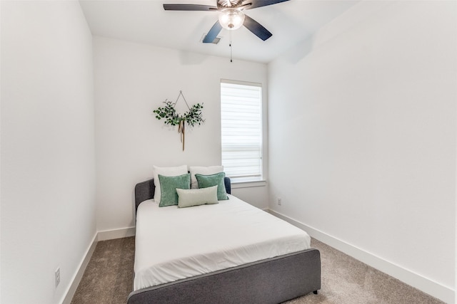 bedroom featuring carpet flooring, a ceiling fan, and baseboards