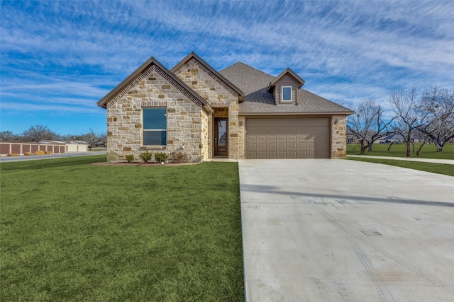 648 Half Moon Way, Runaway Bay, TX 76426 - french country home with driveway, a front lawn, a garage, and stone siding