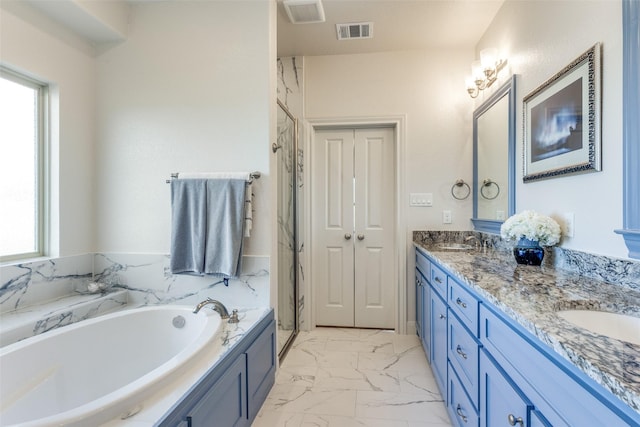 full bathroom with a garden tub, a sink, visible vents, marble finish floor, and double vanity