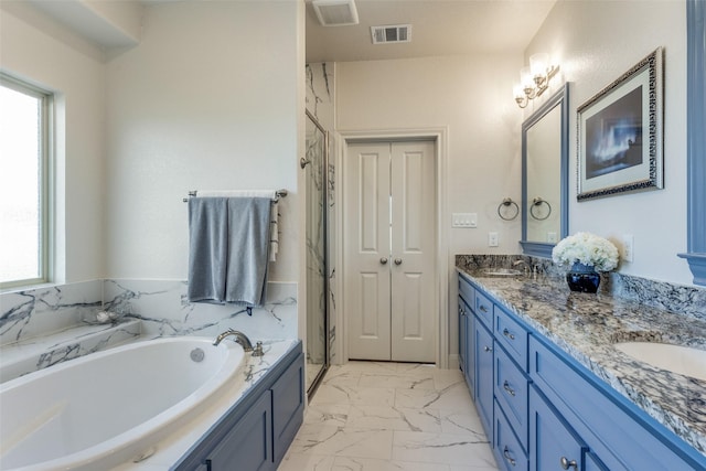 648 Half Moon Way, Runaway Bay, TX 76426 - bathroom with plenty of natural light, a garden tub, marble finish flooring, and double vanity