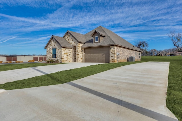 648 Half Moon Way, Runaway Bay, TX 76426 - french provincial home with driveway, cooling unit, stone siding, a front lawn, and brick siding
