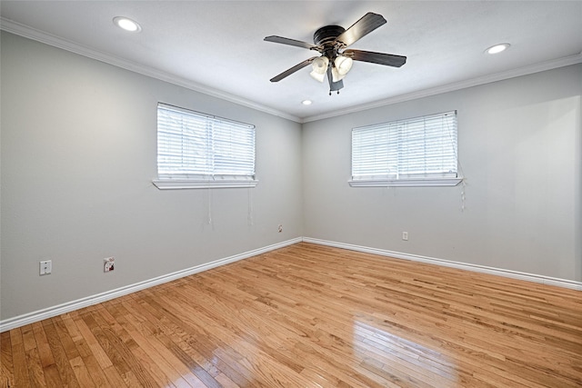 spare room with recessed lighting, a ceiling fan, baseboards, light wood-style floors, and ornamental molding