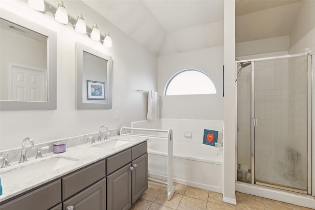 full bathroom with a garden tub, tile patterned flooring, a sink, and a stall shower